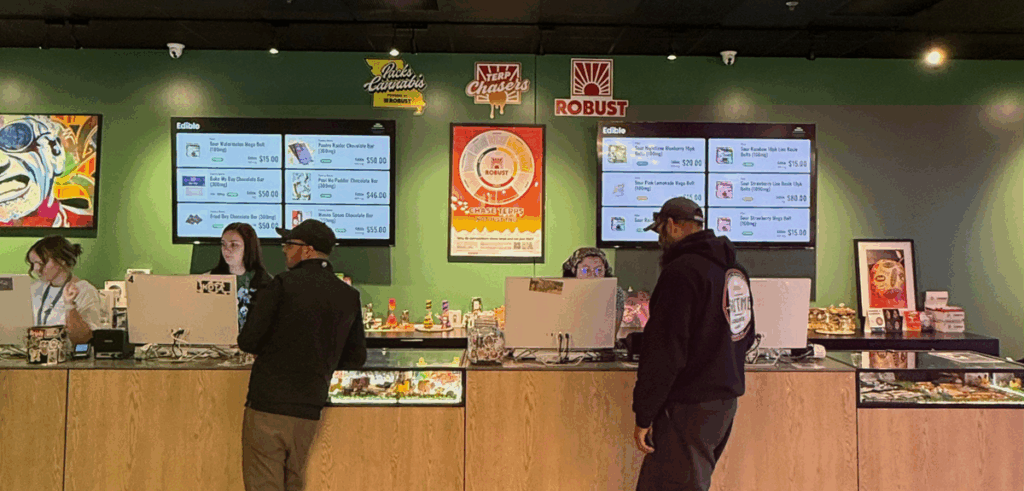 Customers make purchases at the Stairway Cannabis Branson sales counter.